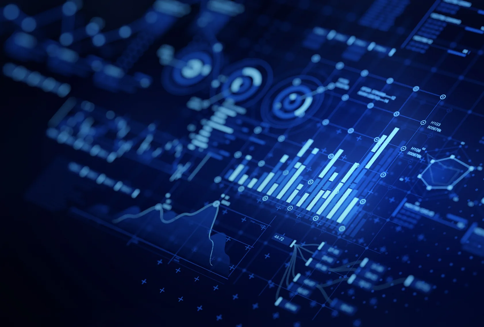 Glowing blue data visualizations on a dark dashboard