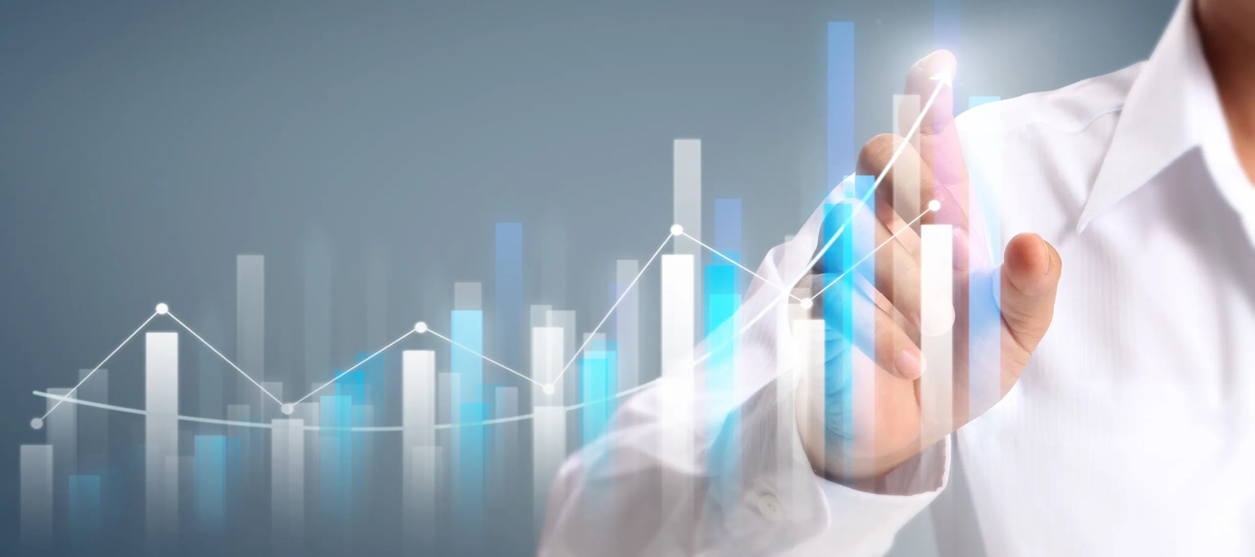 A hand touches a glowing, rising bar chart
